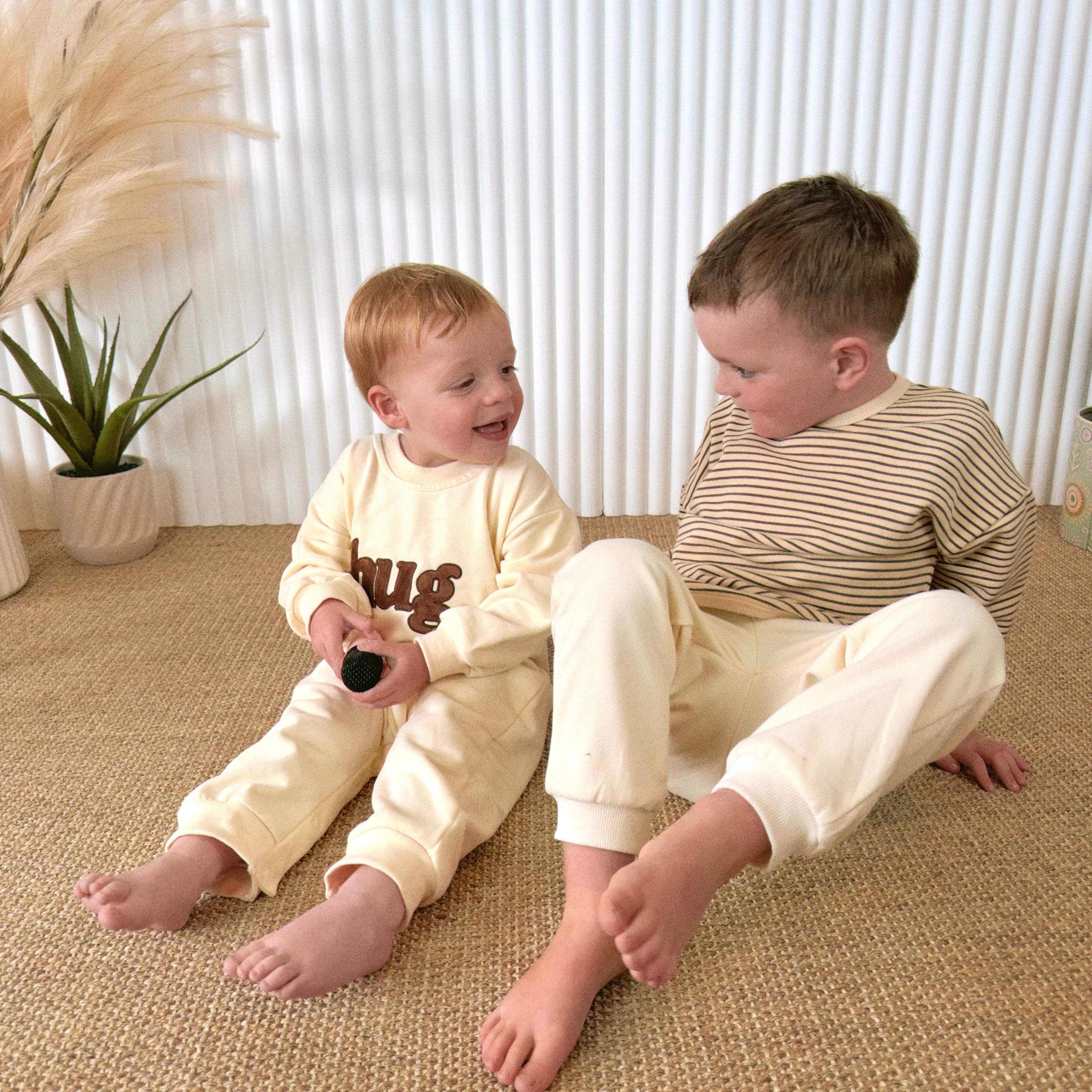 Unisex "Hug" Onesie
